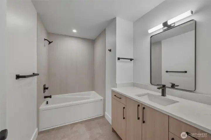 Upper floor full bathroom. Upper floor full bathroom.