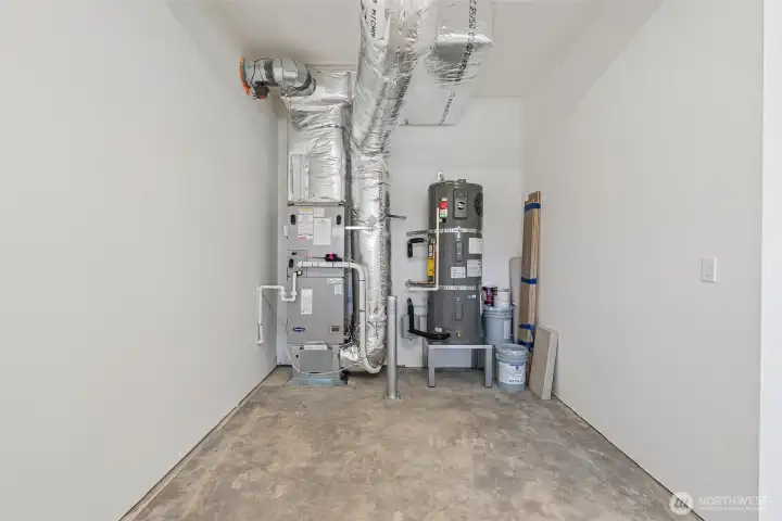 High efficiency Carrier electric forced-air furnace and Electric hybrid water heater.