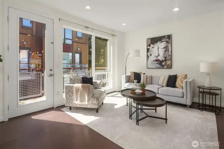 Living area with access to private balcony.
