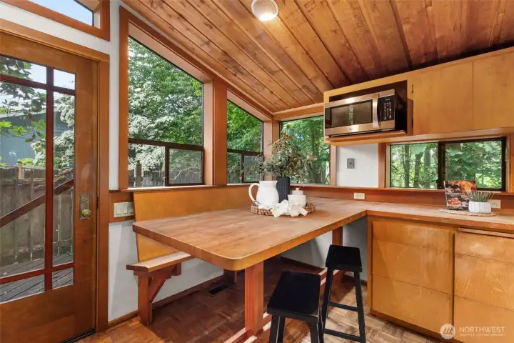 Eat in kitchen features private deck - perfect for bird watching in the morning