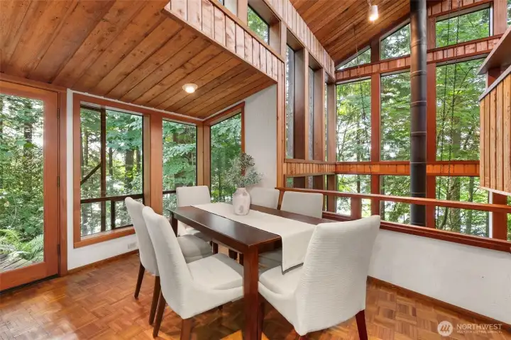 Dining space with another exterior access to private deck and more views