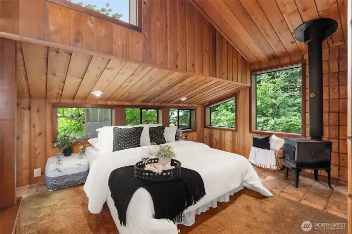 Primary suite complete with views and wood stove