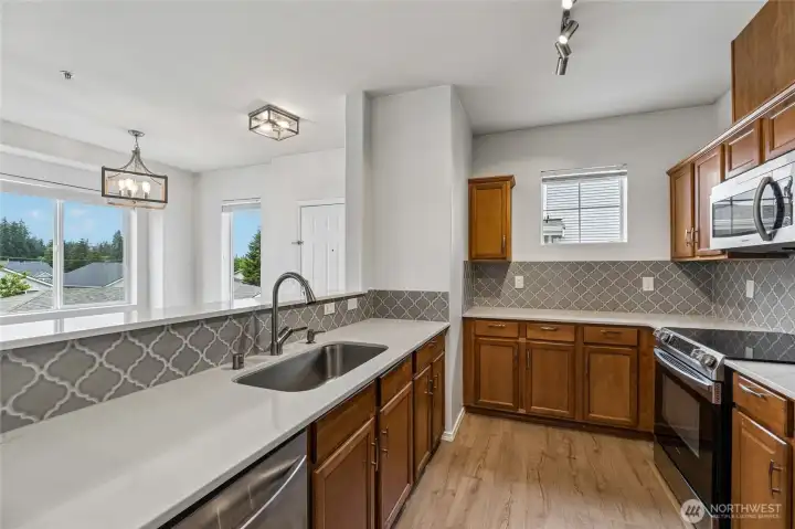 Updated kitchen with quart countertops