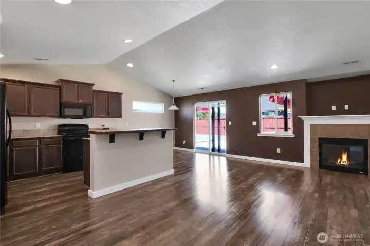 Comfortable living room with a cozy propane fireplace.