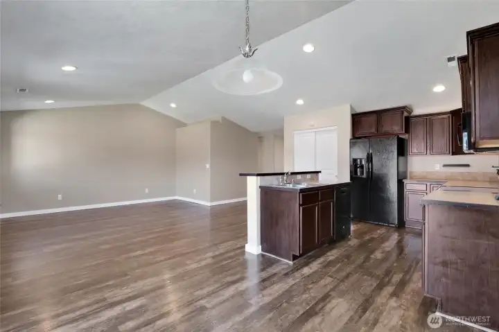 Open layout keeps the kitchen connected to the living areas.