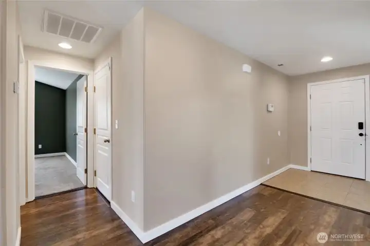 A welcoming entry opens into a thoughtfully designed floor plan with easy flow throughout the home.
