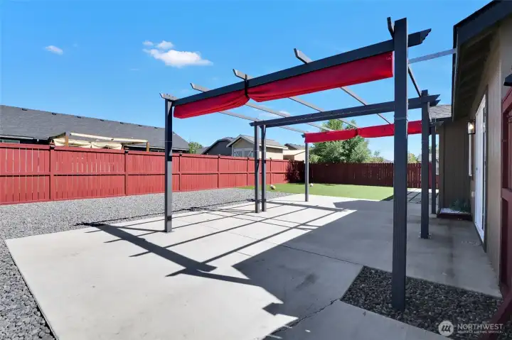 Fully fenced backyard for added privacy.