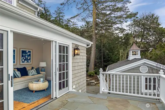 Sunroom or extra bedroom looks onto dock and boat house