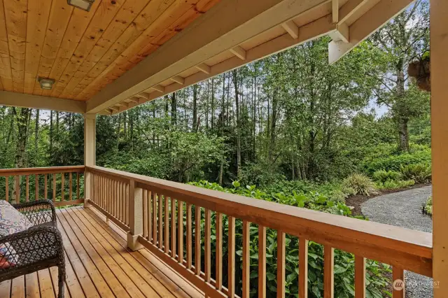 Covered front porch is a perfect place to sit and enjoy the views, and the quiet.