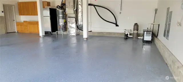 three car garage floors with epoxy finish.