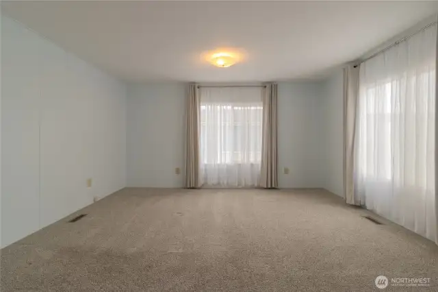 Spacious Primary Bedroom with ample room for a King Sized Bed