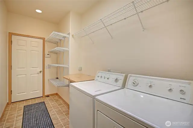 Dedicated laundry room with extra storage