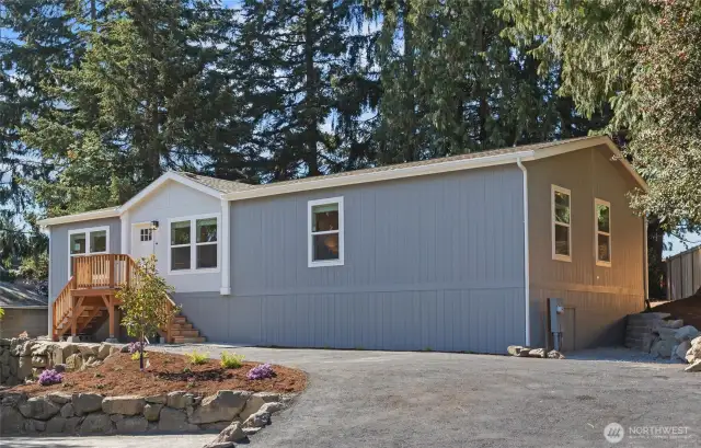 Timeliness exterior color with beautiful front landscape