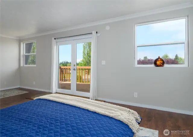 2nd upstairs bedroom with outside deck