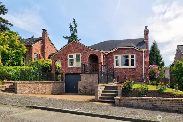 This tidy 1931, 3 bedroom, 3 bathroom Tudor lives large and enjoys an attached garage, as well as 2 additional off street parking spaces. It's also Move-In Ready.