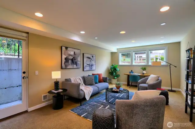 The spacious family room on the lower level opens to a patio and the rear yard.