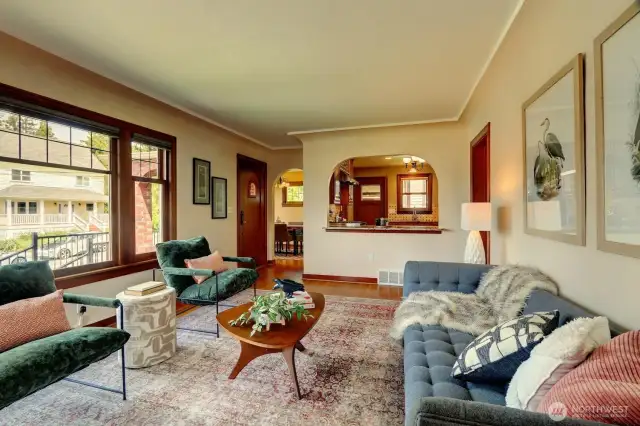 The kitchen and dining rooms open to the living area. And the mahogany doors and trim give this home a luxury feel.