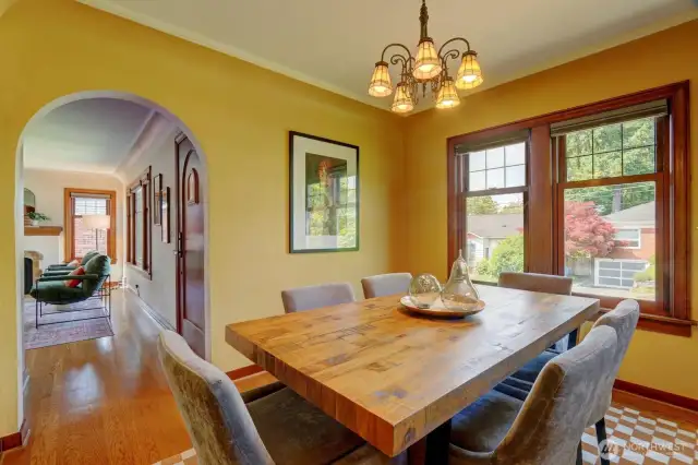 The cheerful dining room seats six.