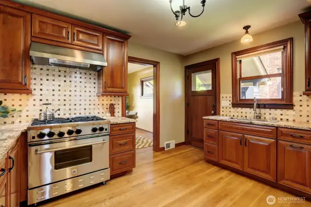 There's room for more than one cook in this spacious kitchen! And the professional gas range and oven make cooking at home more fun.