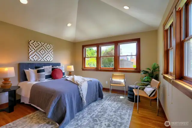 The primary bedroom enjoys a vaulted ceiling and double closets. This space was part of a two level addition in 2010.