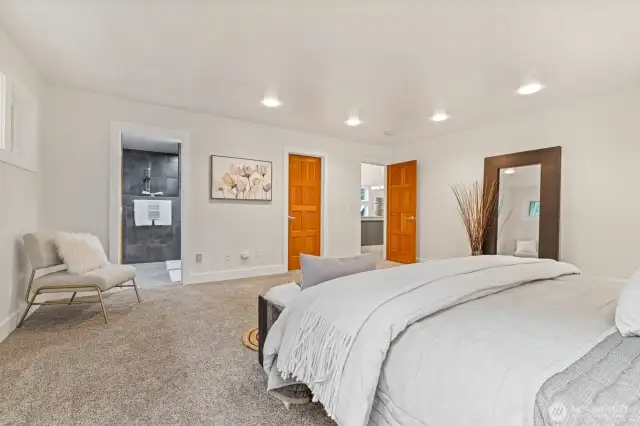 Oversized primary suite with room to relax and recharge