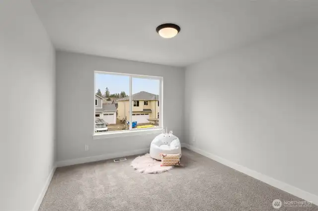 Picture of previously completed home in the same community. For illustrational purposes only. Actual plans and specs may vary. Some features shown are upgrades.