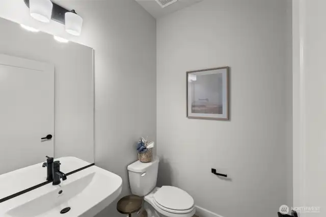 Picture of previously completed home in the same community. For illustrational purposes only. Actual plans and specs may vary. Some features shown are upgrades.