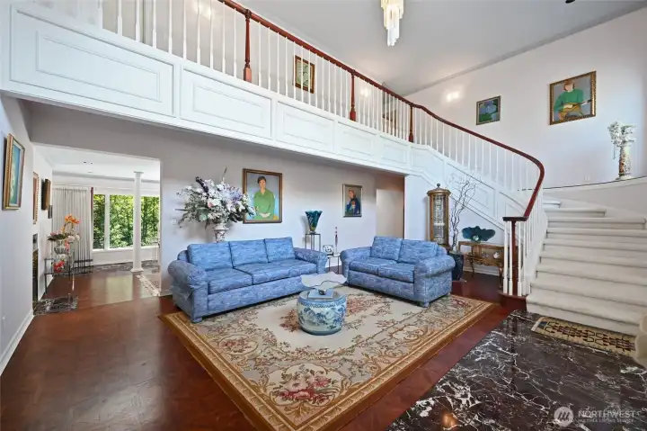 The sweeping staircase offers a truly grand entrance