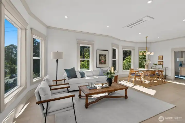 Spacious main floor living & dining area. Tall ceilings, recessed mini-split heating/cool unit.