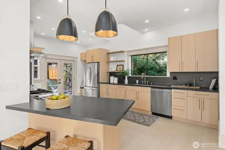 Well appointed kitchen with great light and easy access to backyard.
