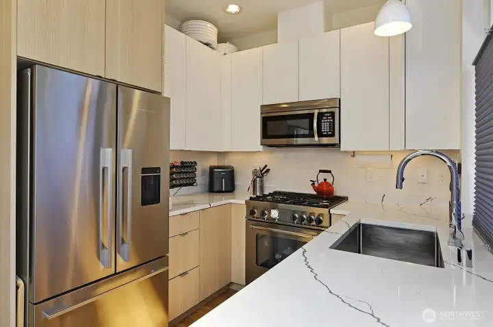 Chef's kitchen with high end appliances.
