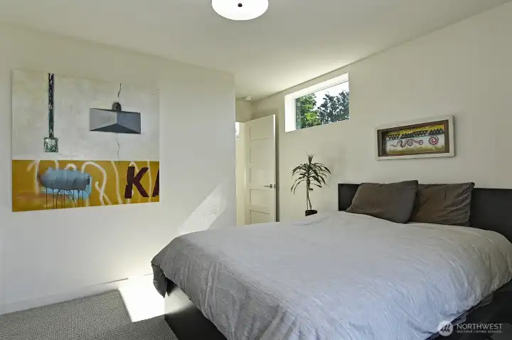 Top level primary with walk-in closet and spa-like bath.