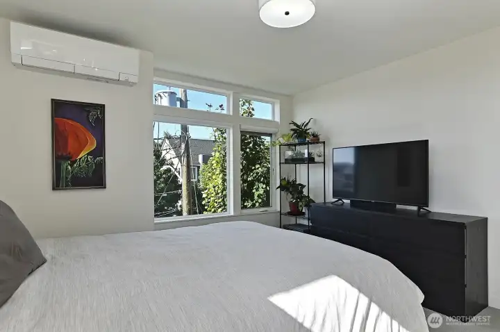 Top level primary with walk-in closet and spa-like bath.