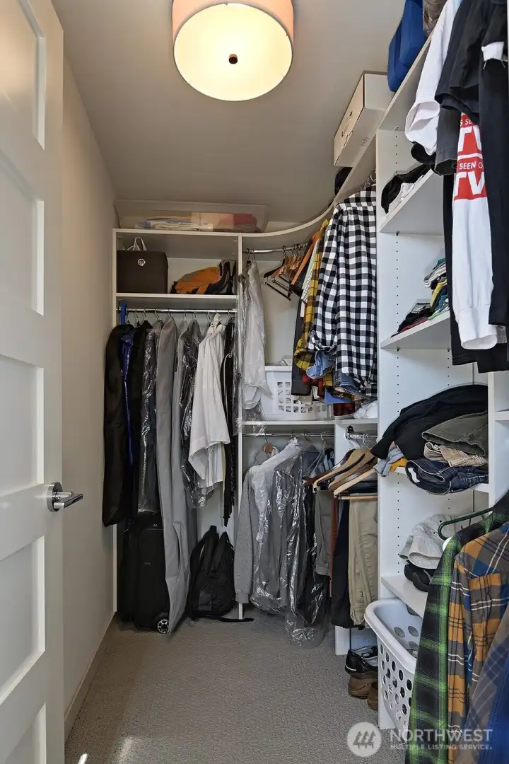 Top level primary with walk-in closet and spa-like bath.