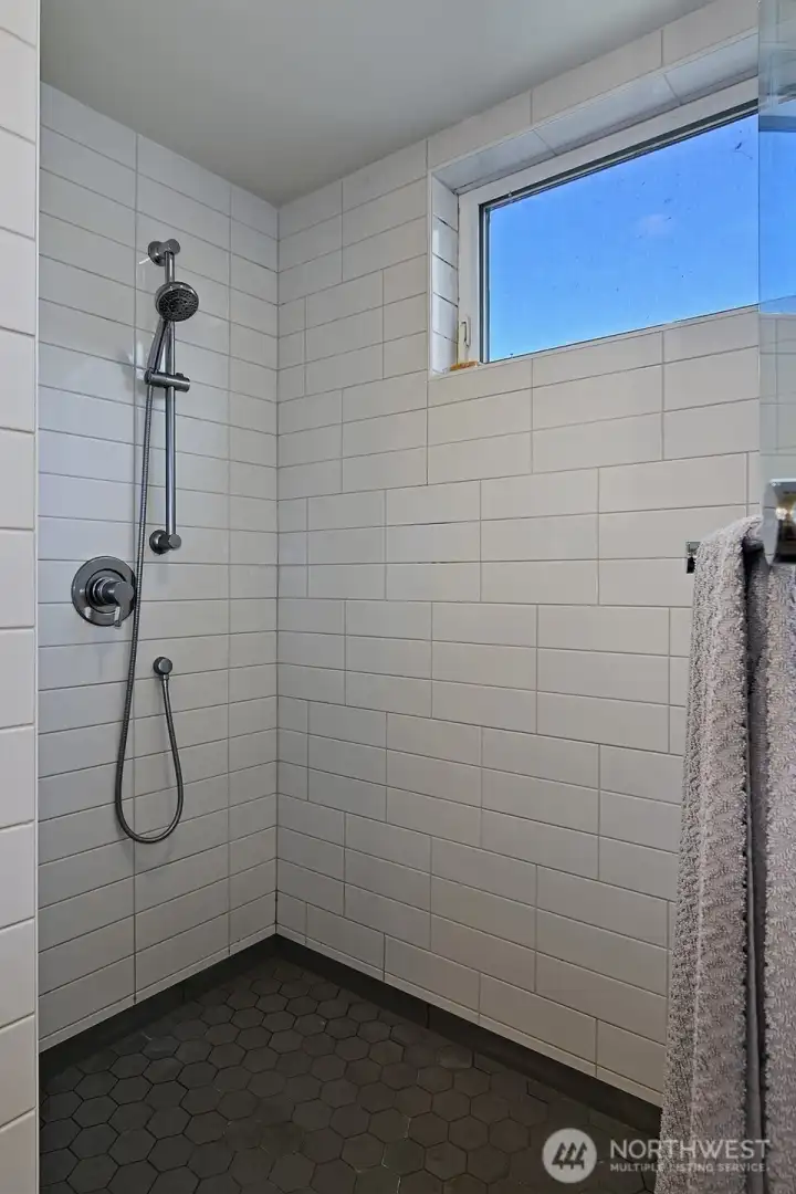 Top level primary with walk-in closet and spa-like bath.