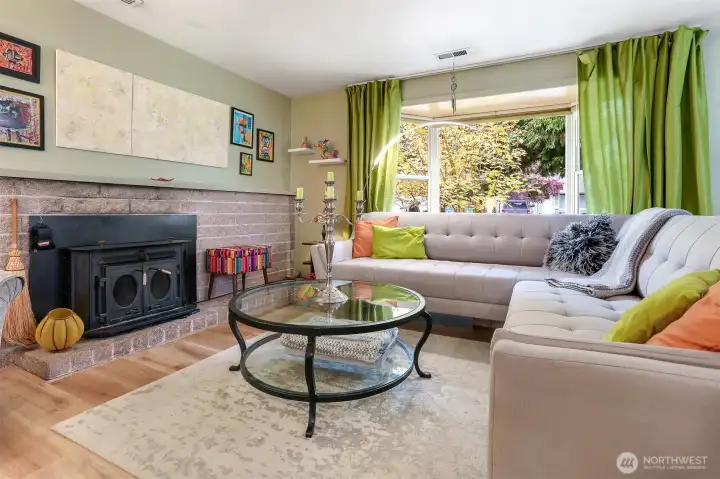 Wood burning fireplace with insert for cozy winter nights! This home also has a newer high efficiency heat pump and AC! Great for all seasons!