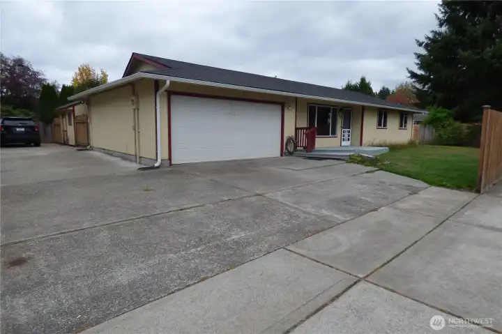 Parking galore! Double garage and entire side of house is paved. Great for rv, boat, ect.