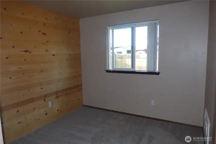 Bedroom #2 with shiplap.