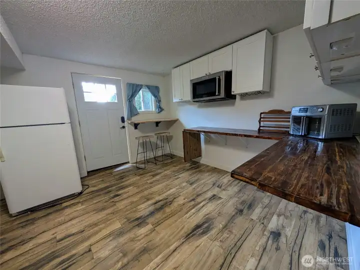 Kitchenette area on the lower level with private entry door.