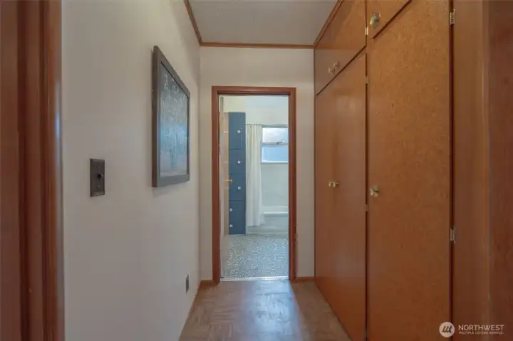 More custom built-in cabinets in hallway--storage galore!