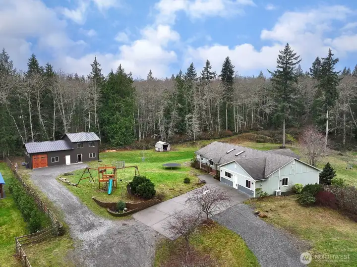 Welcome to 5180 Camelot Court!  A 5 acre parcel packed full of goodness!