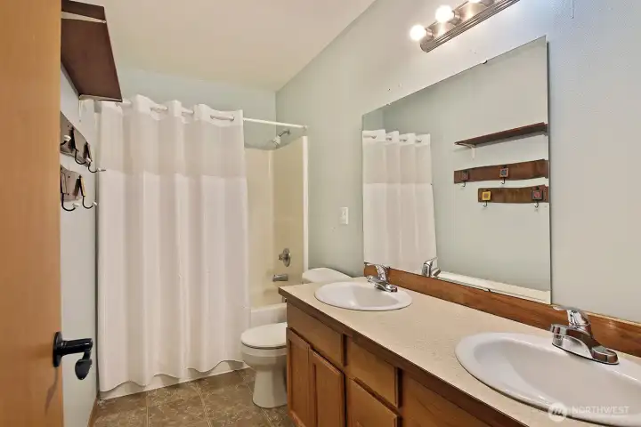 Full Bath on hall with double sinks.