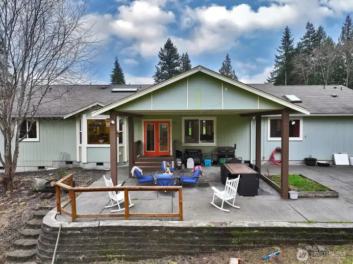 Spacious patio with covered area just off the living room.