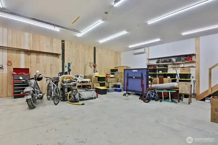 Shop area on the ground level is well lit for working and also heated/ac with dutless mini splits.