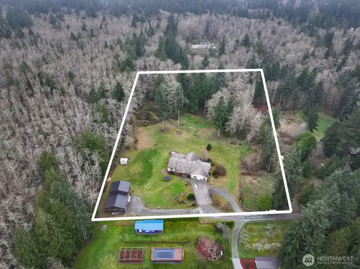 This property offers something for everyone!  There is also a fenced garden space with small orchard in the lower right corner...