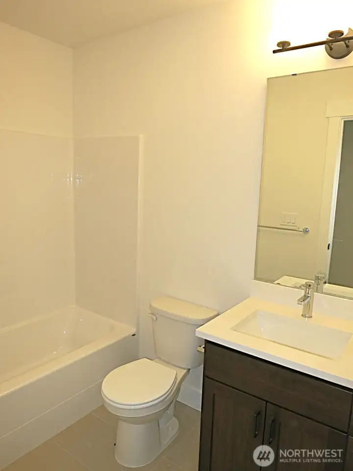 Downstairs full bathroom.