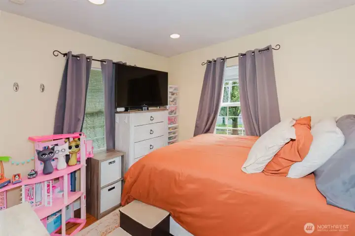 Bedroom #1 with nice can lighting. The room will accommodate a king bed.