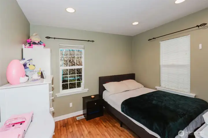 Bedroom #2 with two windows for natural light.