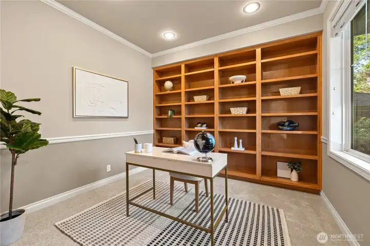 Neutral tones, built ins and abundant lighting with blinds for privacy