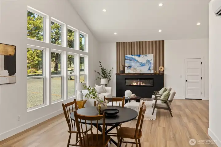 Triple-paned windows fill the living room with natural light